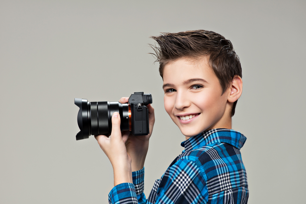 boy-with-photo-camera-taking-pictures-portrait-caucasian-boy-with-digital-camera.jpg