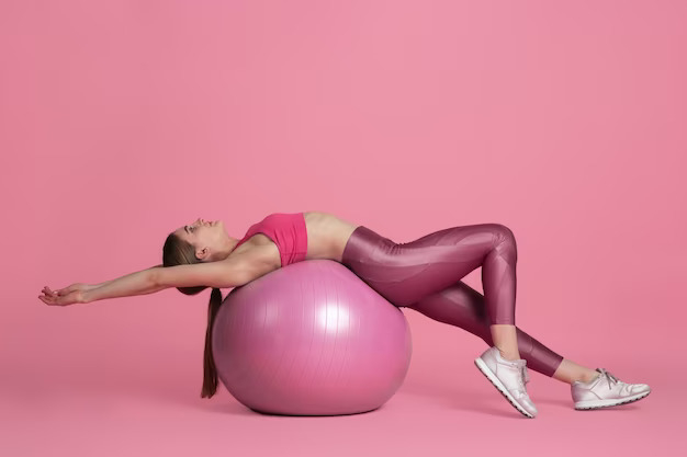 beautiful-young-female-athlete-practicing-pink-studio-wall-monochrome-portrait_155003-34085.jpg