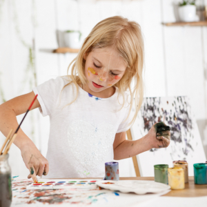 creative-beautiful-female-child-with-blonde-hair-working-her-picture-art-room.jpg