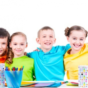 group-children-sitting-table-with-markers-crayons-colored-cardboard_186202-6324.jpg