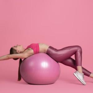 beautiful-young-female-athlete-practicing-pink-studio-wall-monochrome-portrait_155003-34085.jpg