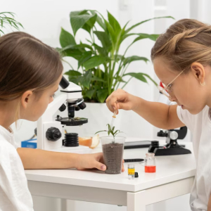 side-view-girls-learning-about-science-with-plant_23-2148778951.jpg