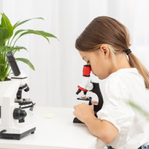 side-view-young-girl-looking-into-microscope_23-2148778947.jpg